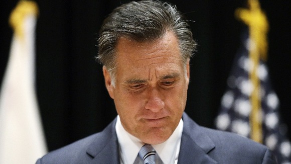 Republican presidential candidate Mitt Romney speaks to reporters about the secretly taped video