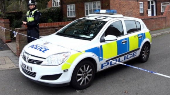 Police guard a property