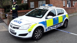 Police guard a property