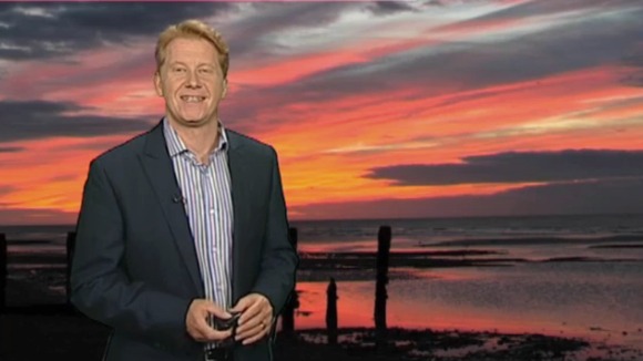 Simon Parkin in front of weather photo