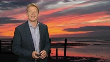 Simon Parkin in front of weather photo
