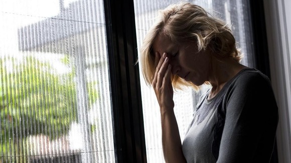 Woman suffering from headache