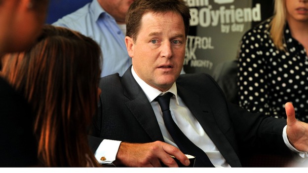 Deputy Prime Minister Nick Clegg talks to teenagers at the St Andrew's Youth club