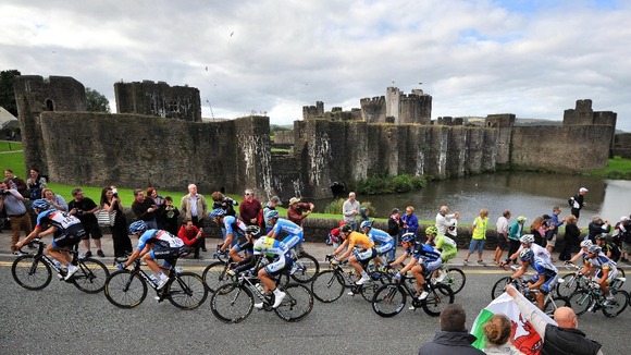 Riders make their way past Caerphilly Castle