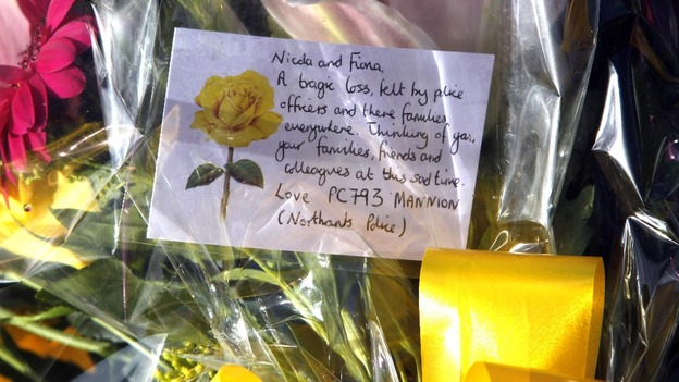 Floral tributes at the scene where PC Fiona Bone and PC Nicola Hughes were killed.