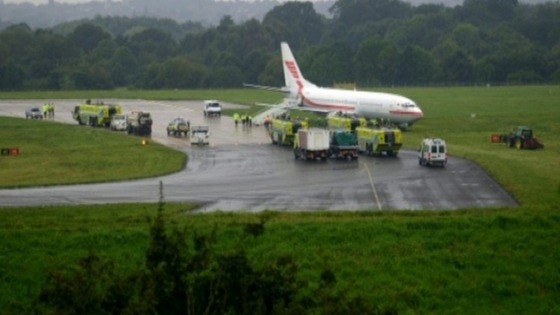 Plane skids off runway