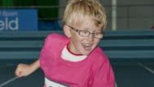 Visually-impaired youngster taking part in track & field