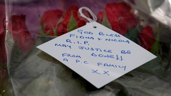 Note that reads: "God bless Fiona + Nicola. RIP. May justice be done!! From a PC family xx"