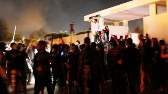 Demonstrators stormed the headquarters of the Ansar al-Sharia militia