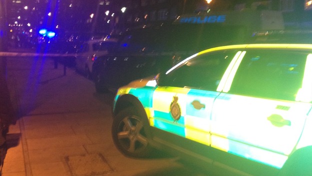 Police at the address in Byng Street in Canary Wharf, east London