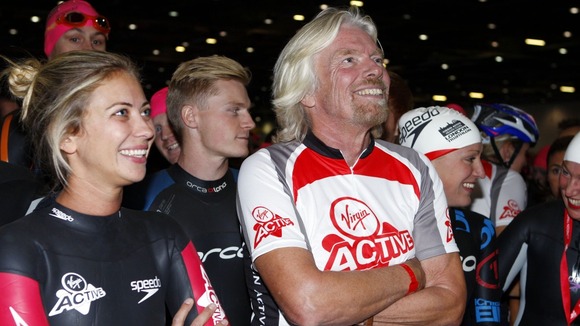 Sir Richard Branson and his daughter Holly (left) at today's Virgin Active London Triathlon.
