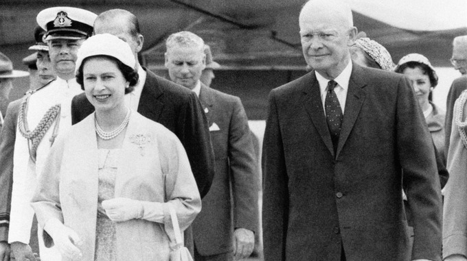 Queen Elizabeth II and US President Dwight D. Eisenhower leaving an airstrip at St. Hubert in Quebec.