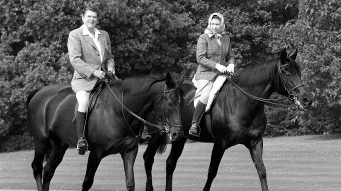 US President Ronald Reagan and Queen Elizabeth II riding in Windsor Home Park.