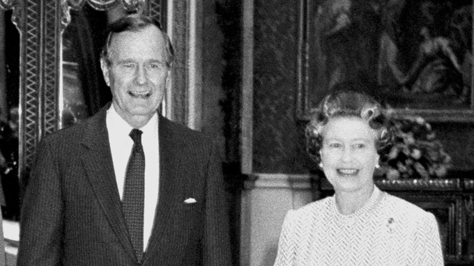S President George Bush standing with Queen Elizabeth II in the Picture Room at Buckingham Palace in London.