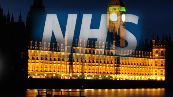 NHS Logo over Westminster