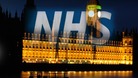 NHS Logo over Westminster