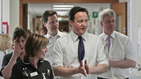 Lansley, Cameron and Clegg in a hospital.