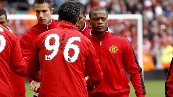 Luis Suarez (left) and Patrice Evra.