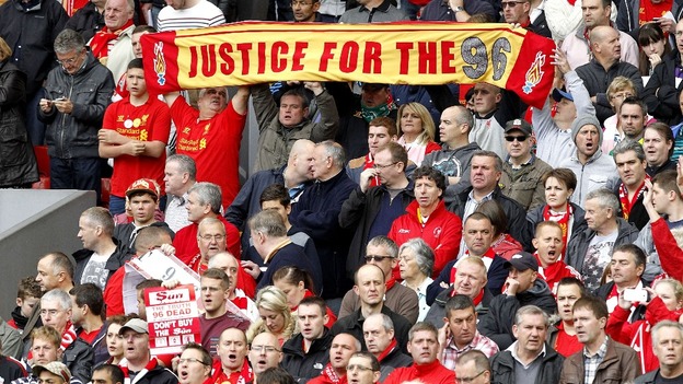 A Liverpool banner honoring the victims and supporting the families affected by the Hillborough disaster prior to the match at Anfield.