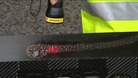 Special grease being used to mark drain covers