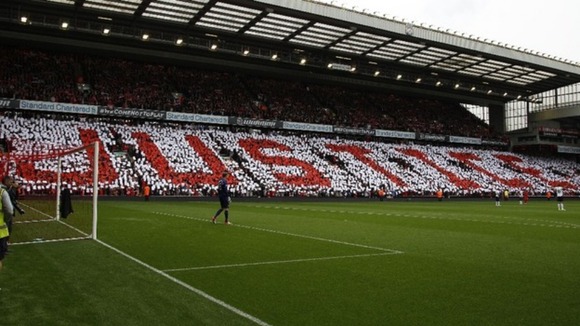 Supporters held up coloured cards in memory of the Hillsborough disaster