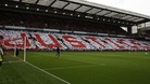 Supporters held up coloured cards in memory of the Hillsborough disaster