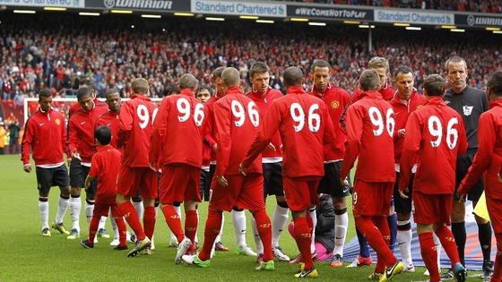Players shake hands.