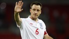 Former England captain John Terry has retired from international football, his management agency have announced