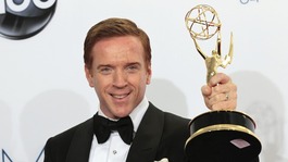 Damian Lewis holds up the award for outstanding lead actor in a drama series