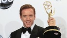Damian Lewis holds up the award for outstanding lead actor in a drama series