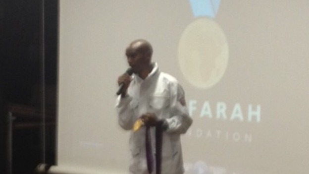 Double Olympic gold medallist Mo Farah talks to students at Feltham Community College today.