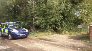 A police 4 wheel drive near the dive site