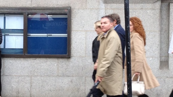 Former News International chief executive Rebekah Brooks (pictured far right) arrives at court today.