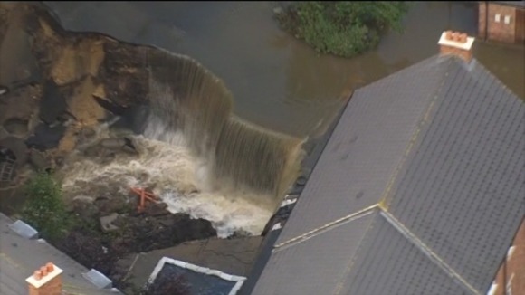 Flooding creates waterfall