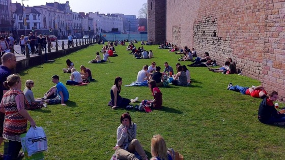 Sunbathers outside Cardiff Castle