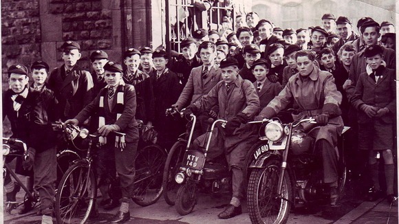 Boys on bikes – features in this photo are still there today, spilling out of Forest Road West entrance
