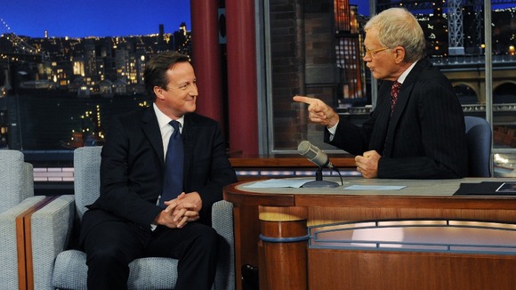 David Cameron talks with talk show host David Letterman on the David Letterman Show in New York,
