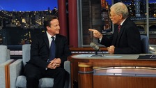 David Cameron talks with talk show host David Letterman on the David Letterman Show in New York,