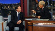 Prime Minister David Cameron (left) talks with talk show host David Letterman.