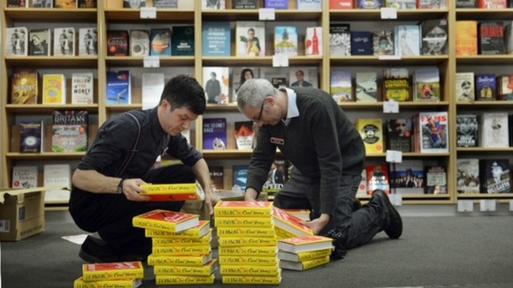 Staff unpack the books extra early this morning.