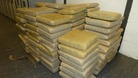 Just some of the hundreds of tape-wrapped packages containing cannabis.