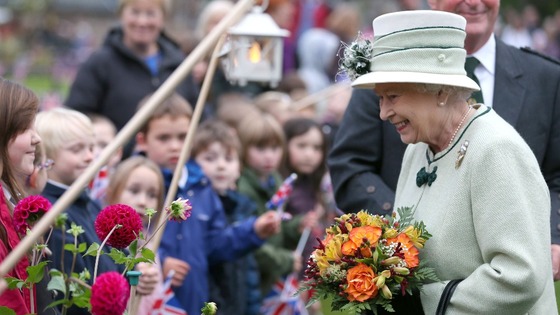 The Queen talks to local children, in Ballater