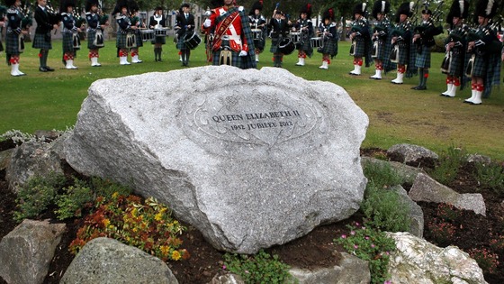 A pipe band stand behind the Ballater Jubilee Cairn, in Ballater, Aberdeenshire