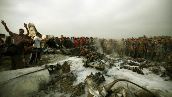 The fire is extinguished by rescue teams.