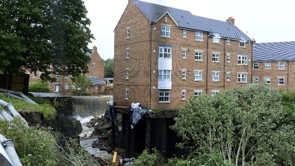 Exposed pilings beneath the houses in Newburn, Newcastle