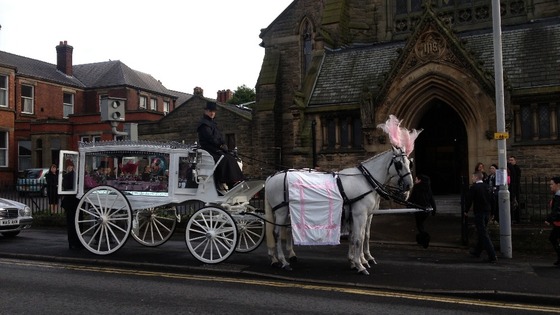 Lia Green's coffin arrives at the English Martyrs' Catholic Church