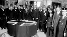 Sir Edward Carson is seen signing the Ulster Covenant at Belfast City Hall in 1912.