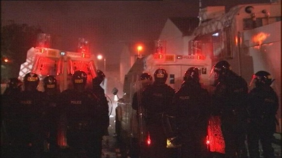 Police at the scene of the unrest in Belfast last month