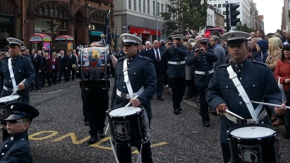 Marchers in the Ulster Covenant parade marching down Belfast's city centre