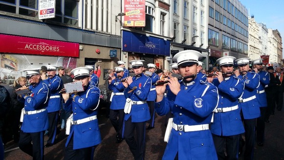 Marchers in the Ulster Covenant parade marching down Belfast's city centre